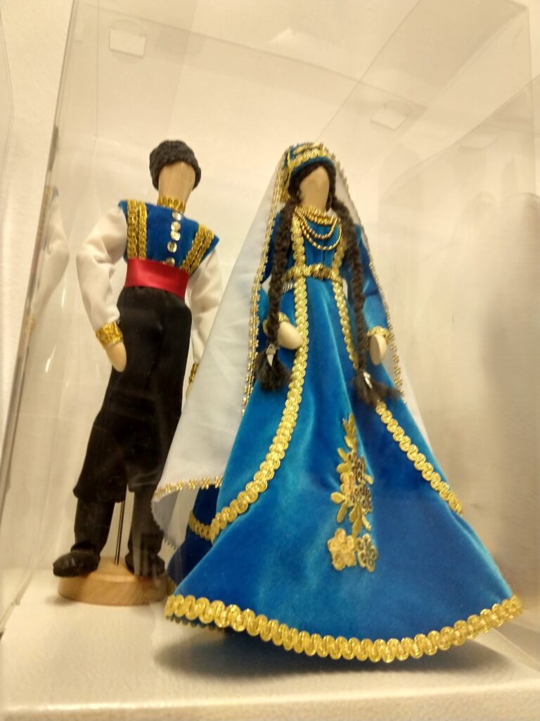 DOLLS IN HANDMADE CLOTHES